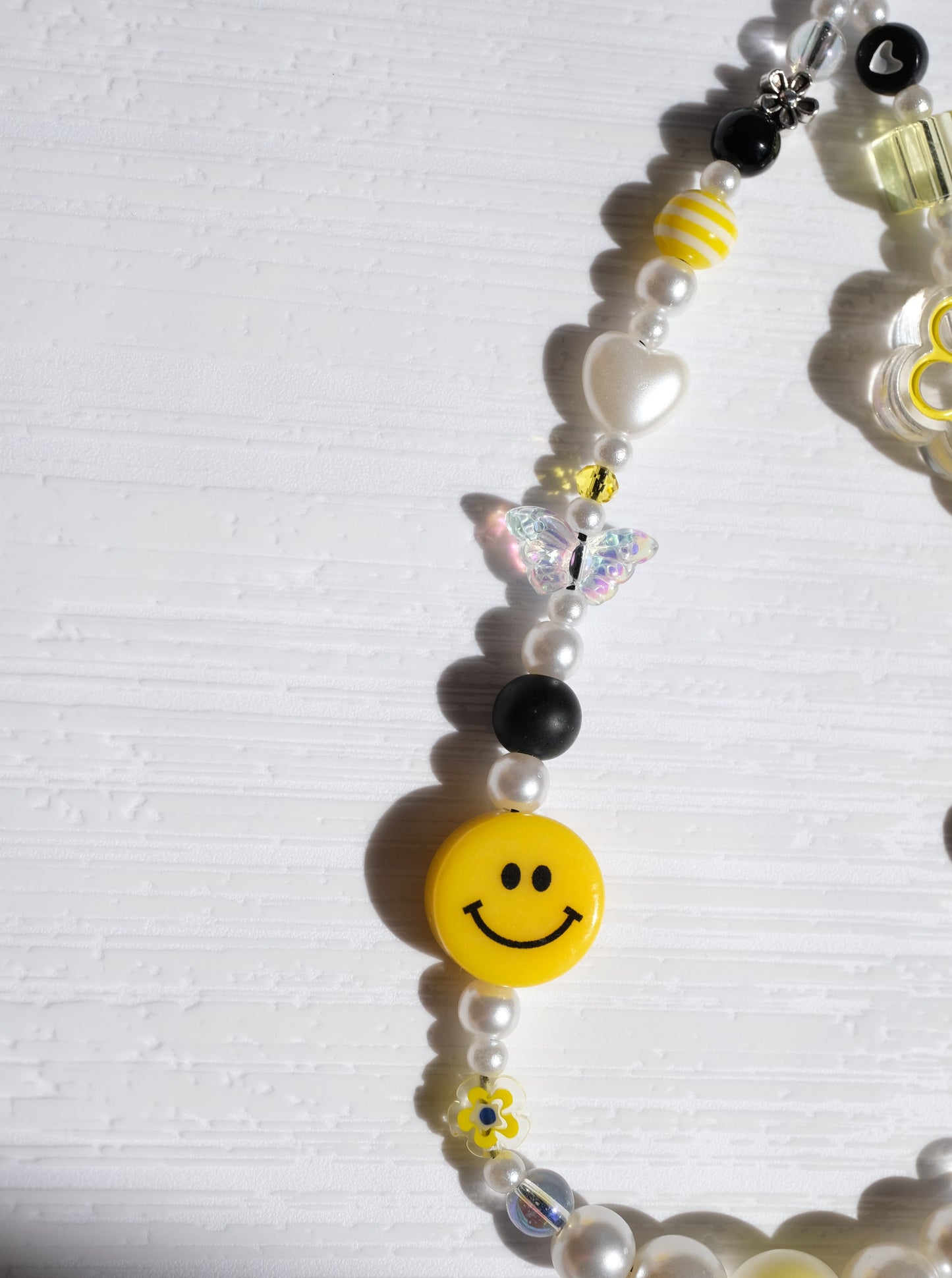 Yellow Smiley Face Phone Strap